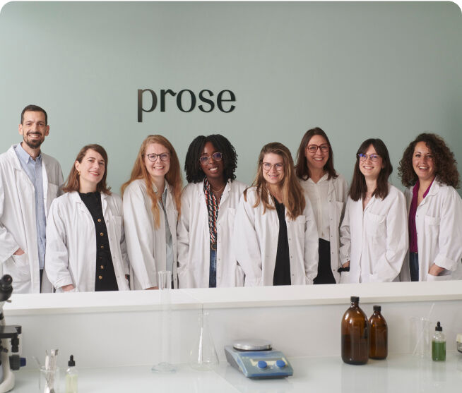 Prose R&D team in lab coats at their innovative facility